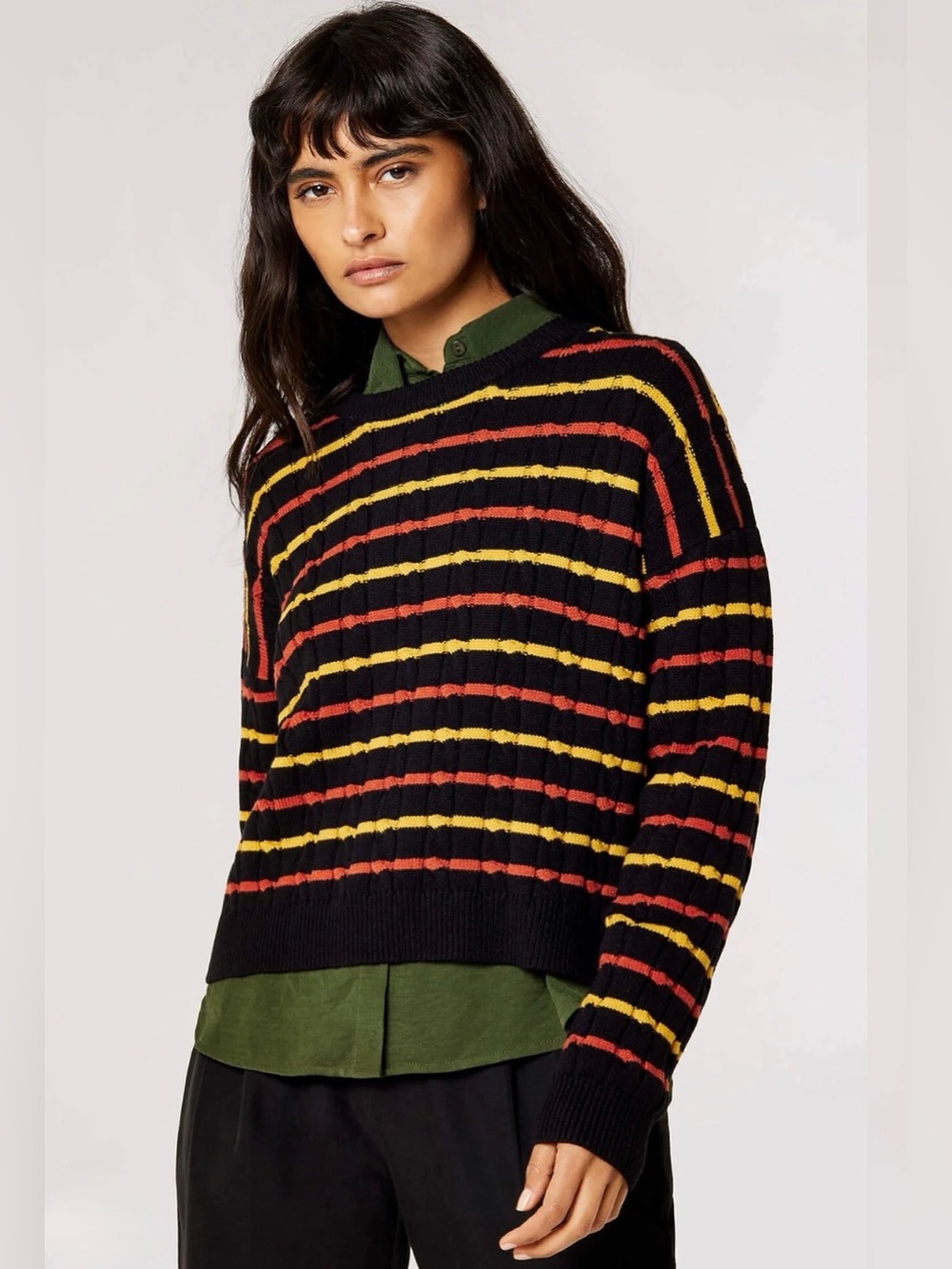 APRICOT Black Crewneck Sweater with Yellow and Rust Stripes